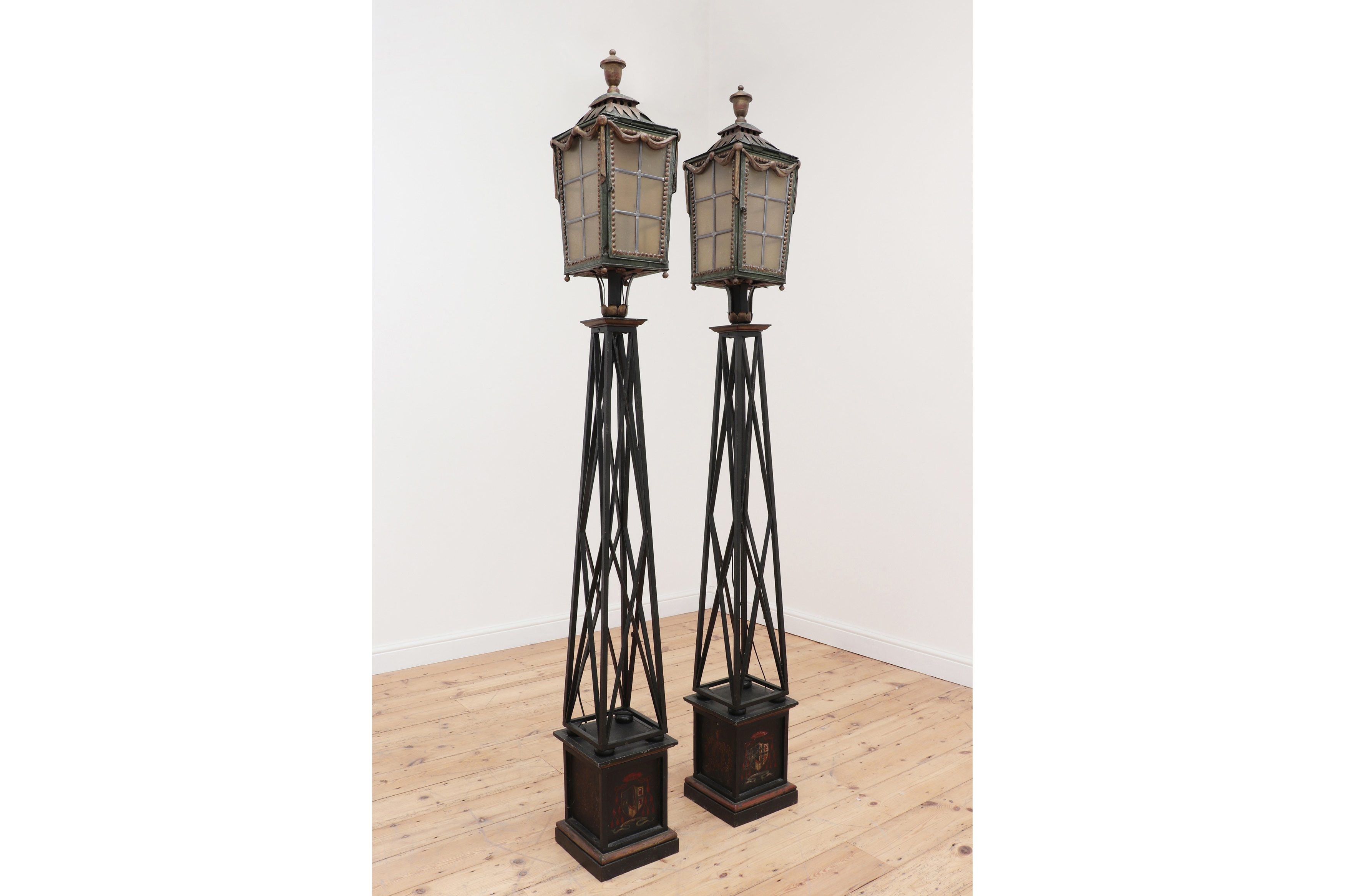A pair of polychrome-painted toleware lanterns